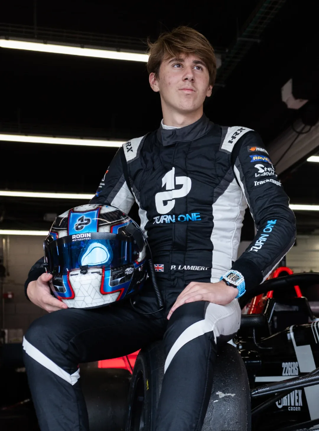 Preston Lambert beside his racing car