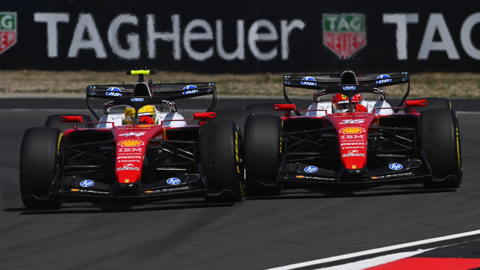 Lewis Hamilton and Charles Leclerc driving Ferrari Formula 1 cars