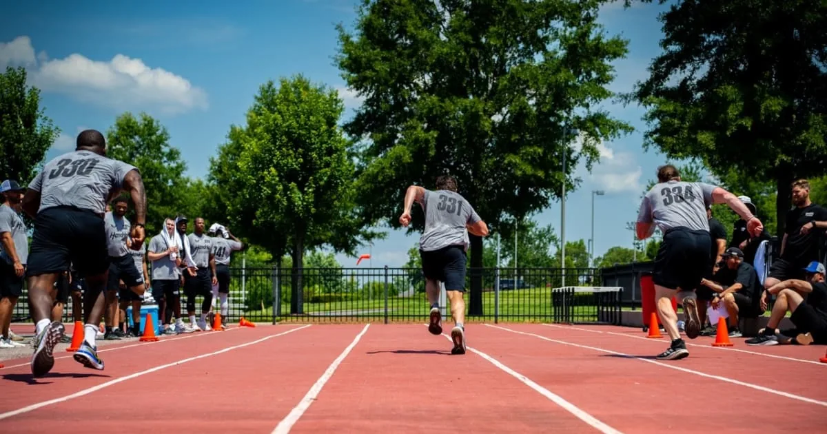 Athletes sprinting during Hendrick Motorsports’ 2024 pit crew combine