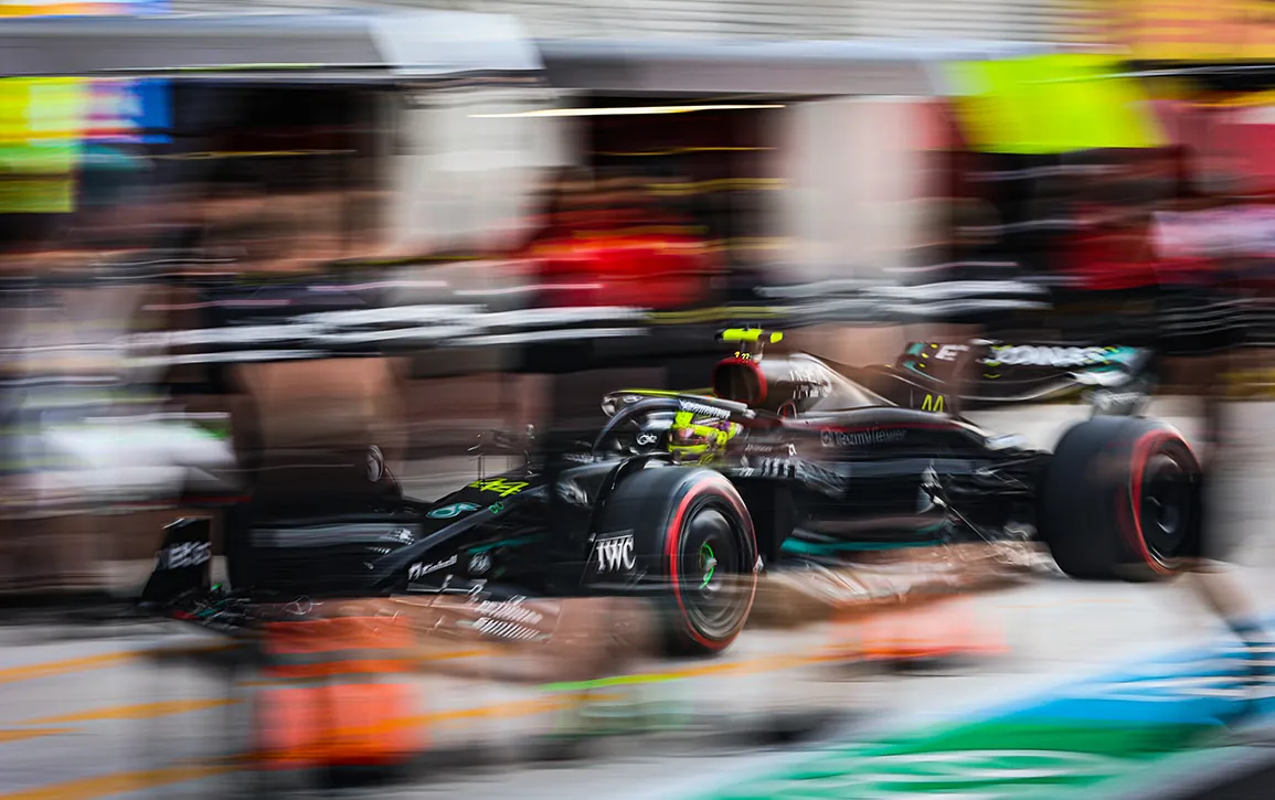 Mercedes Formula 1 car moving through the pit lane in an official reference photograph